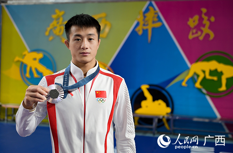 廣西摔跤運(yùn)動員曹利國。人民網(wǎng) 雷琦竣攝